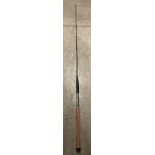 A one piece fishing rod approximately 6'5" - no bag