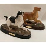 Two ceramic spaniels on plinths by Beswick and Royal Doulton each approximately 30cm x 22cm high