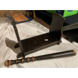 A wood truncheon 40cm and a small stained wood book stand with painted decoration to each end 28cm