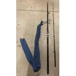 A Sundridge Cygnus 6oz two piece fishing rod approximately 9'4" complete with blue canvas bag