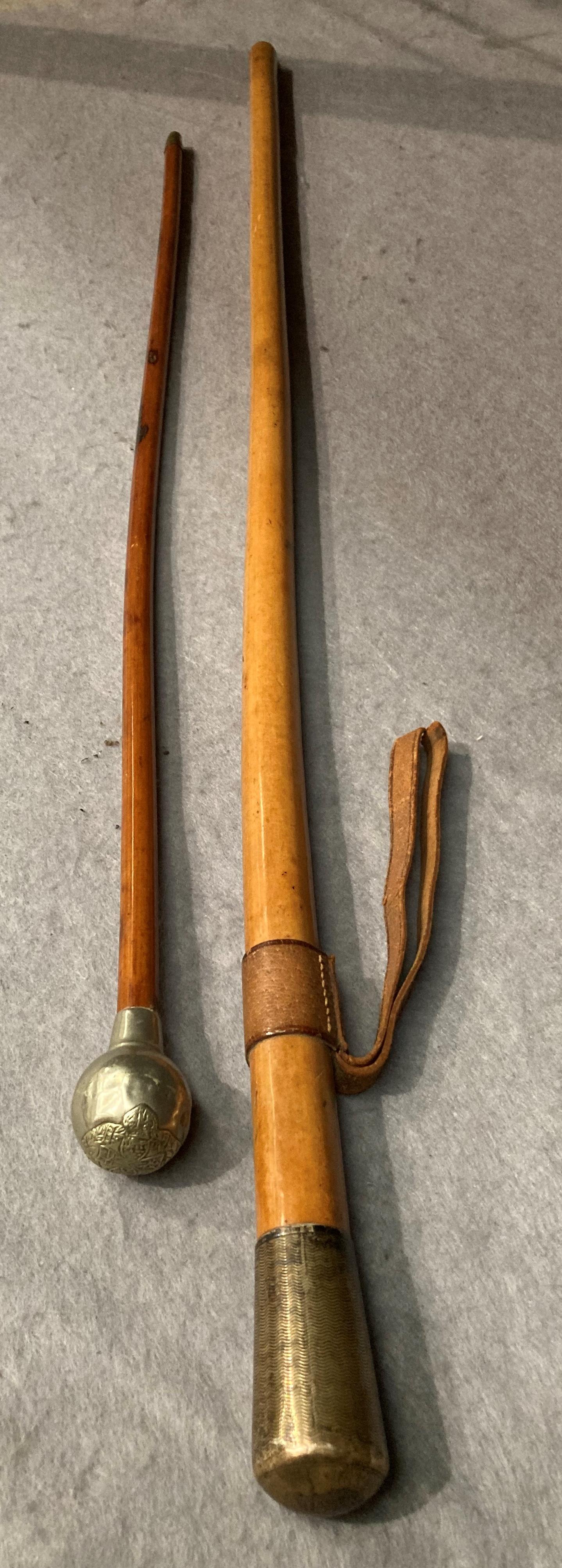 A wood swagger stick with silver coloured handle inscribed 'Inns of Court O.T.