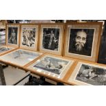 Eight framed black and white photographs of tribal people,