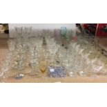 Ninety pieces of glassware including four Babycham glasses, Cherry Charm glass, pint glasses,