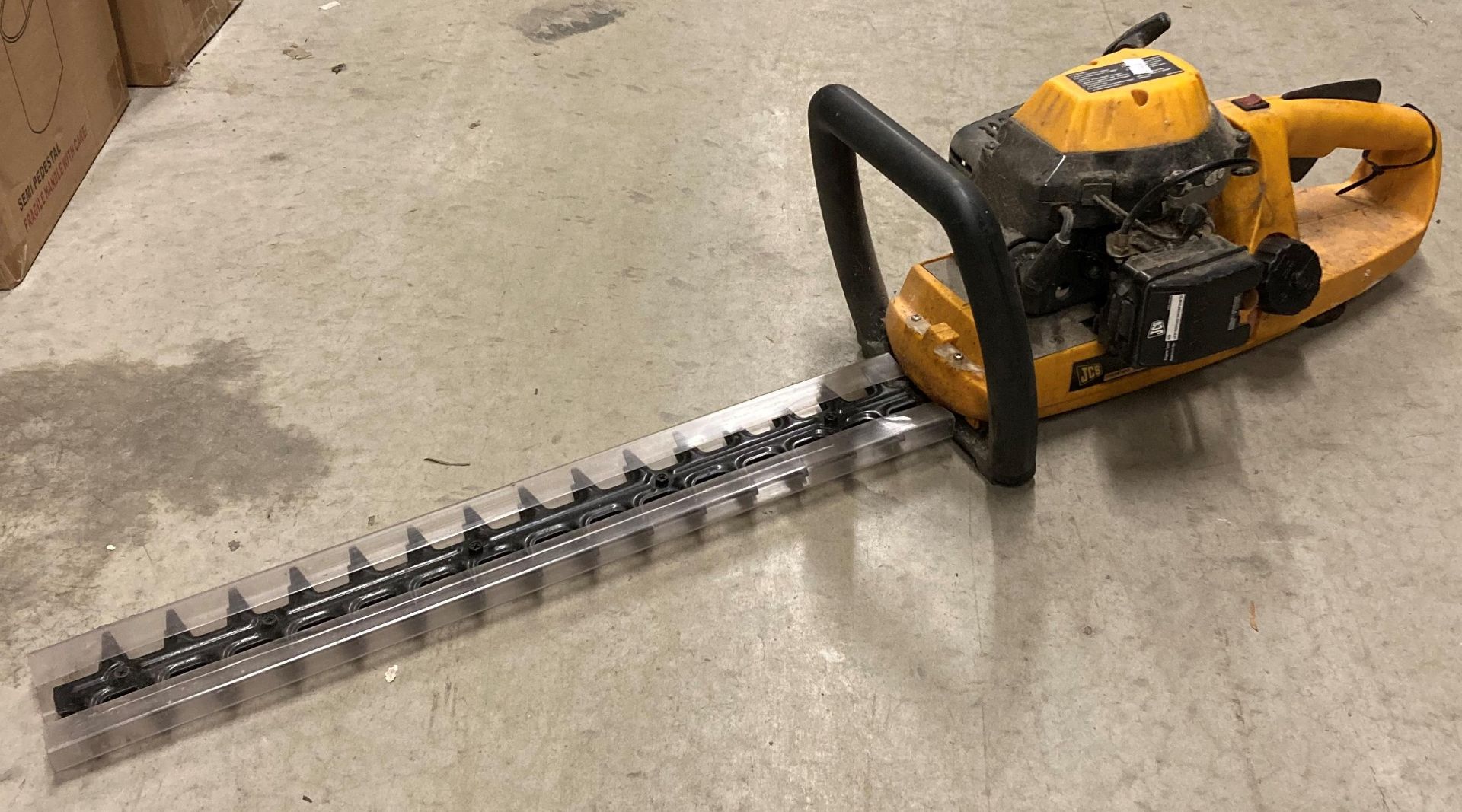 JCB petrol hedge trimmer (X05,