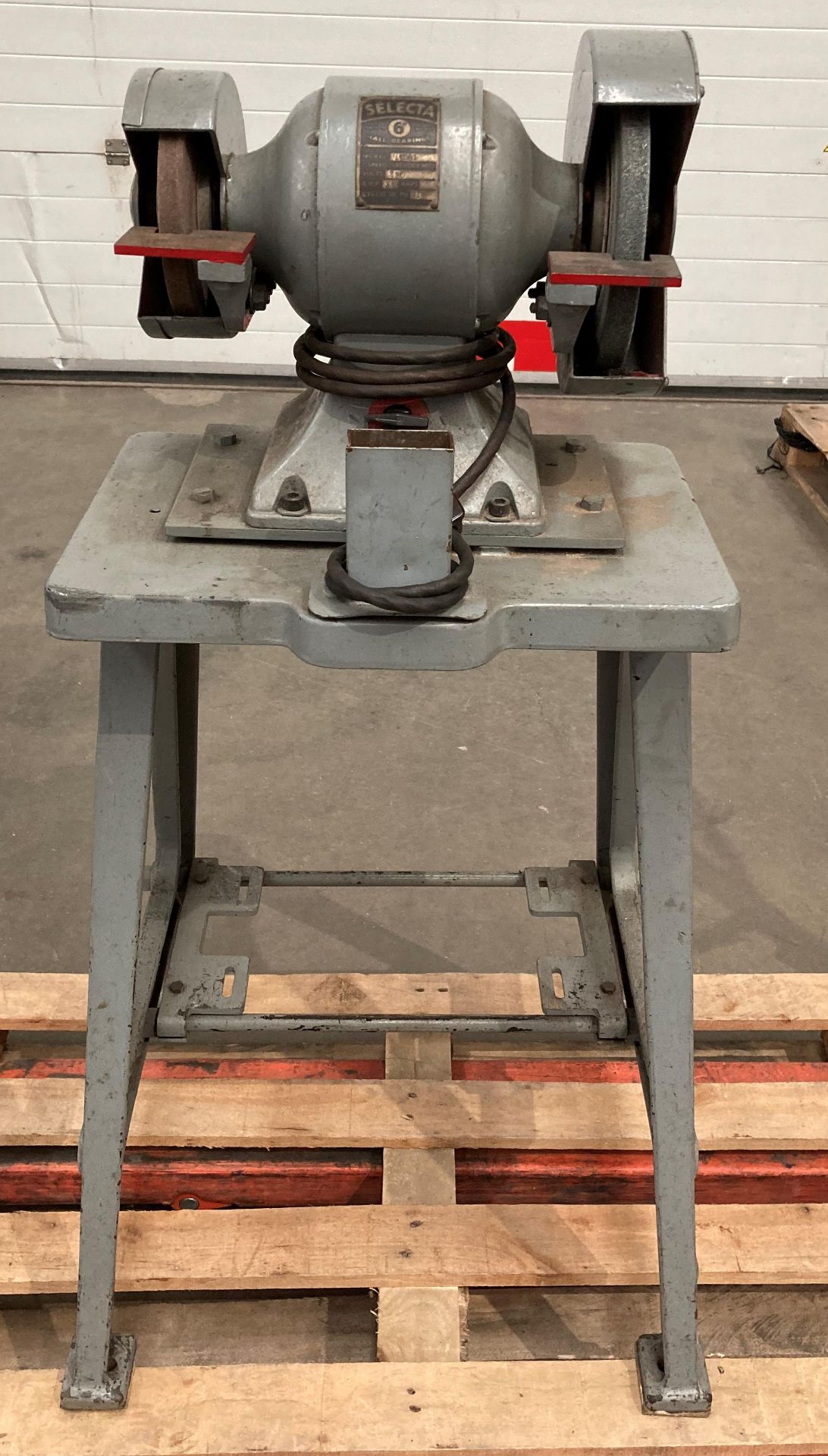 Selecta 6" double headed grinder 240v mounted on a cast iron table (middle of warehouse)