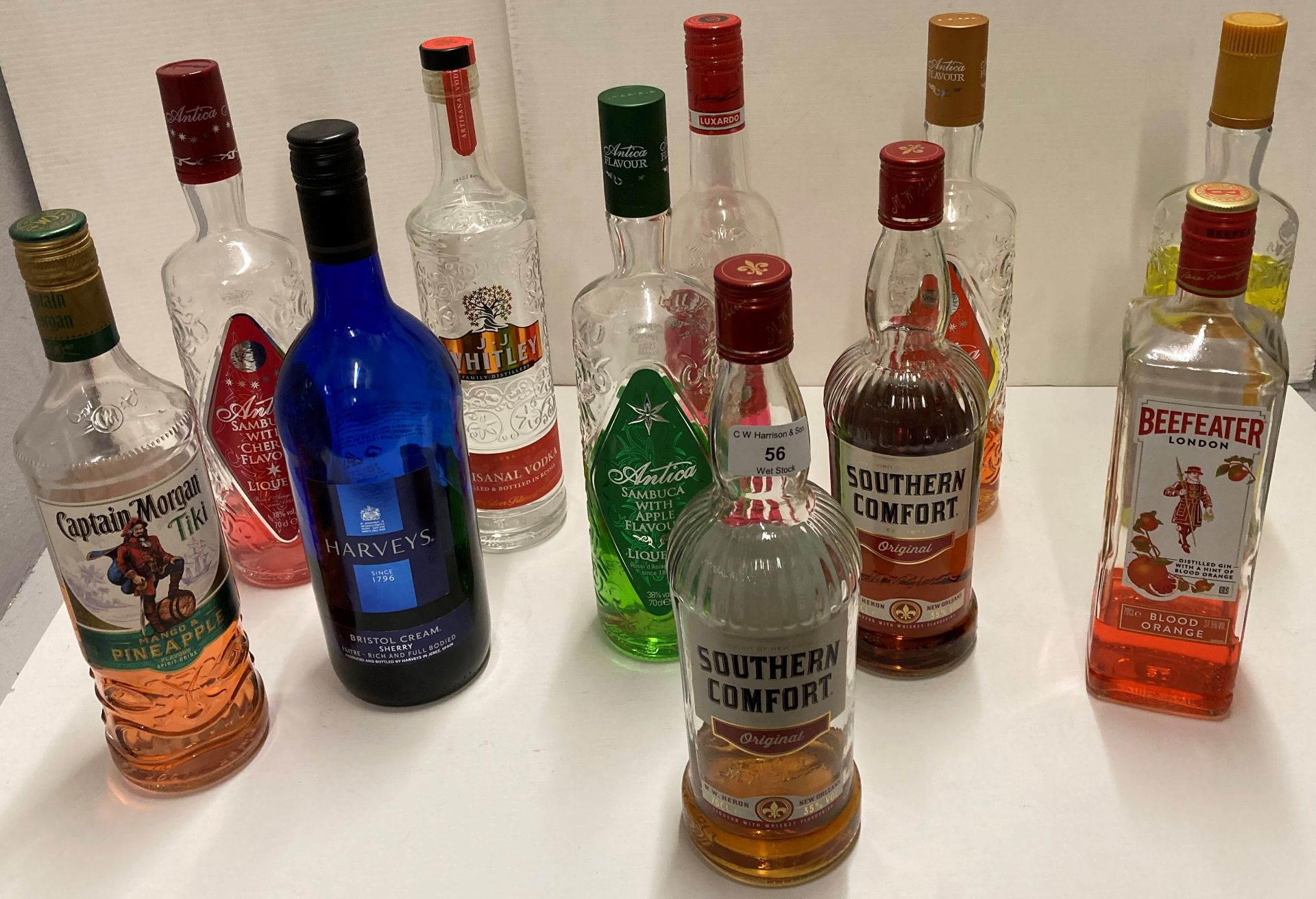 11 x part bottles of assorted spirits including Southern Comfort, Beefeater gin,