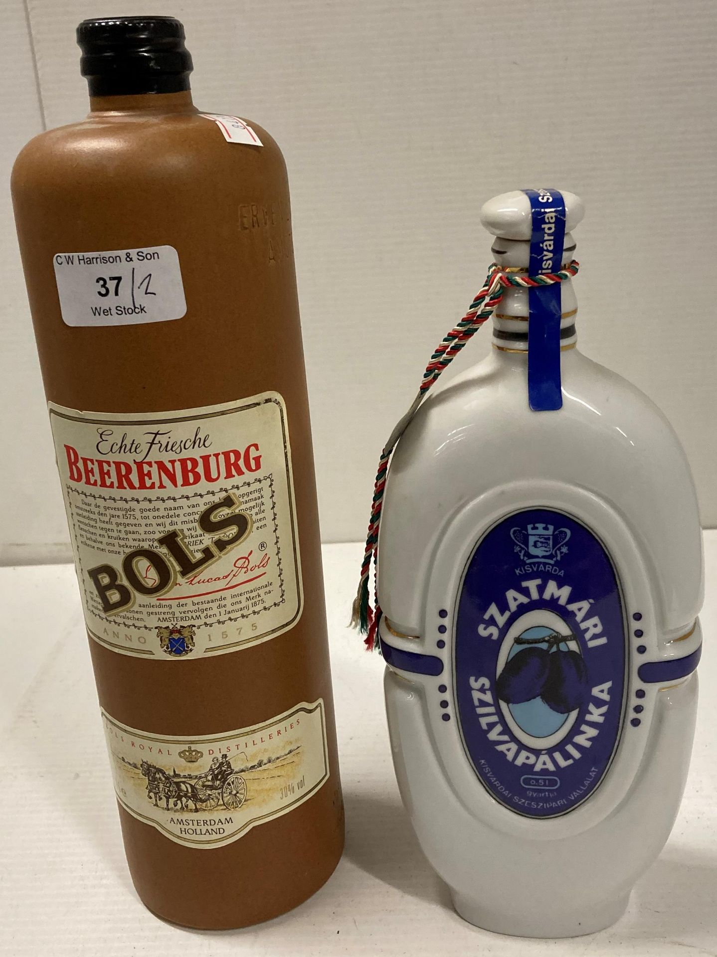 A one litre bottle of Bols Beerenburg and a 50cl bottle of Szatmari Szilvapalinka (AA06)