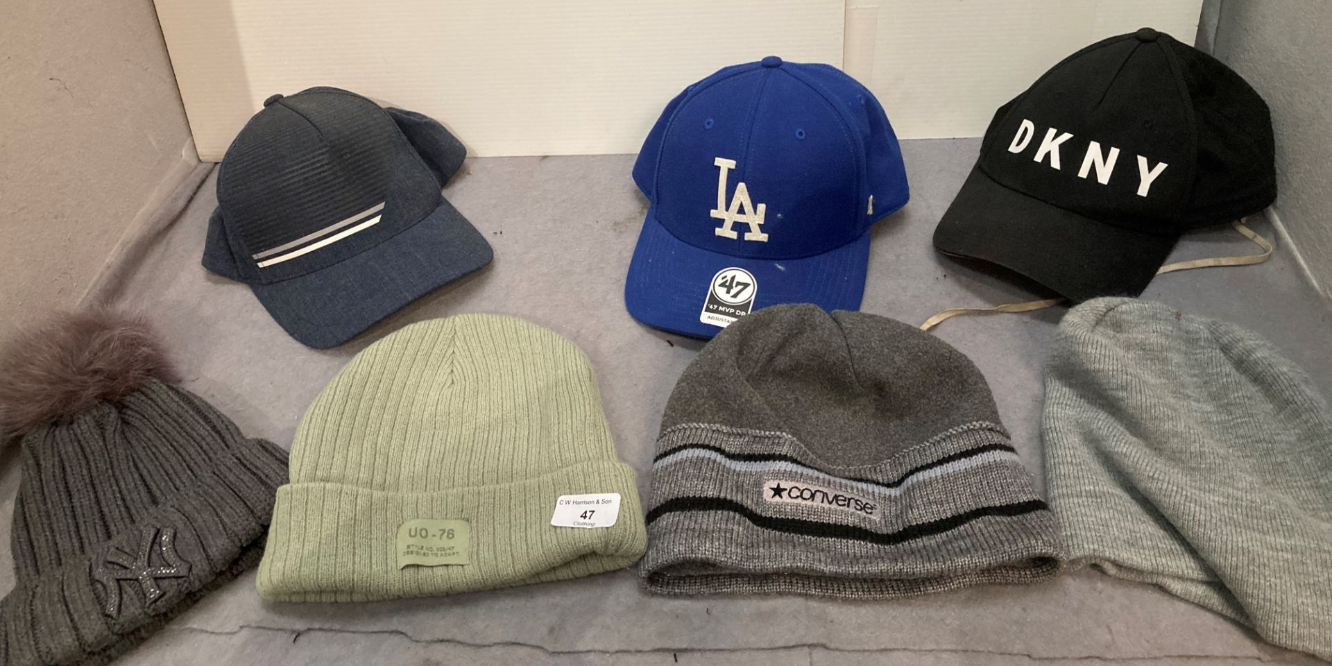 Seven items - three baseball caps and four beanies etc *Please note the final purchase price is