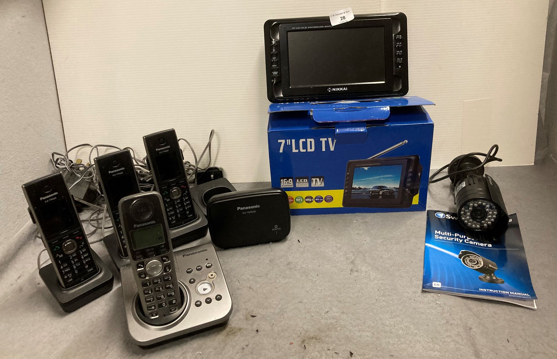 Four Panasonic cordless telephones and docking stations,