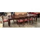 A Victorian mahogany extending dining table with two extra leaves on turned shaped legs