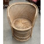 A woven low back tub armchair
