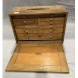A Neslein portable wooden tool chest, eight drawer, drop door loose,
