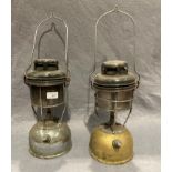 Two paraffin fired storm lanterns