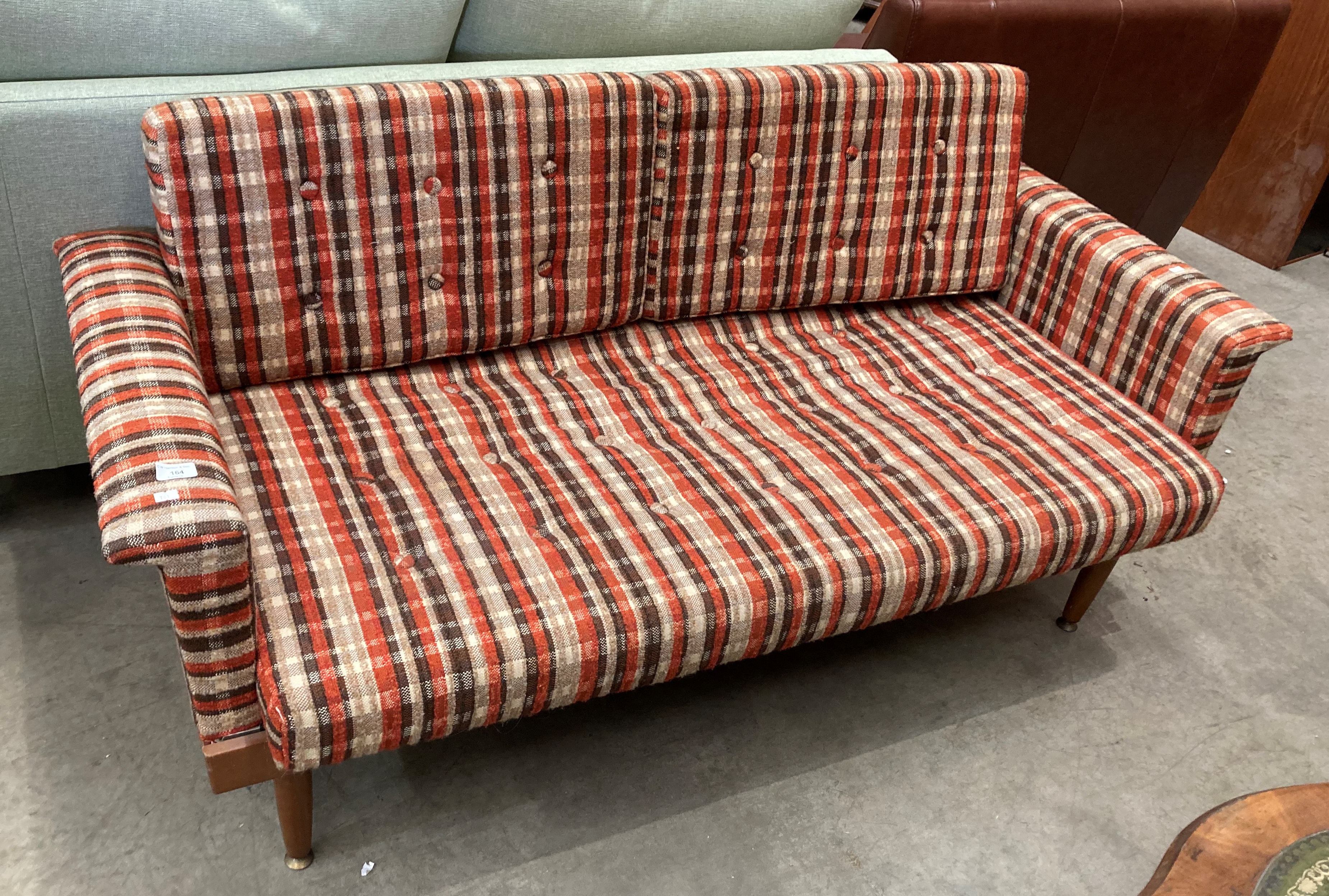 A mid Twentieth Century teak framed bed settee with brown/red and ivory patterned upholstery - - Image 2 of 4