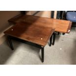 A teak topped Long John coffee table on black painted wood frame 49cm x 137cm and a similar coffee