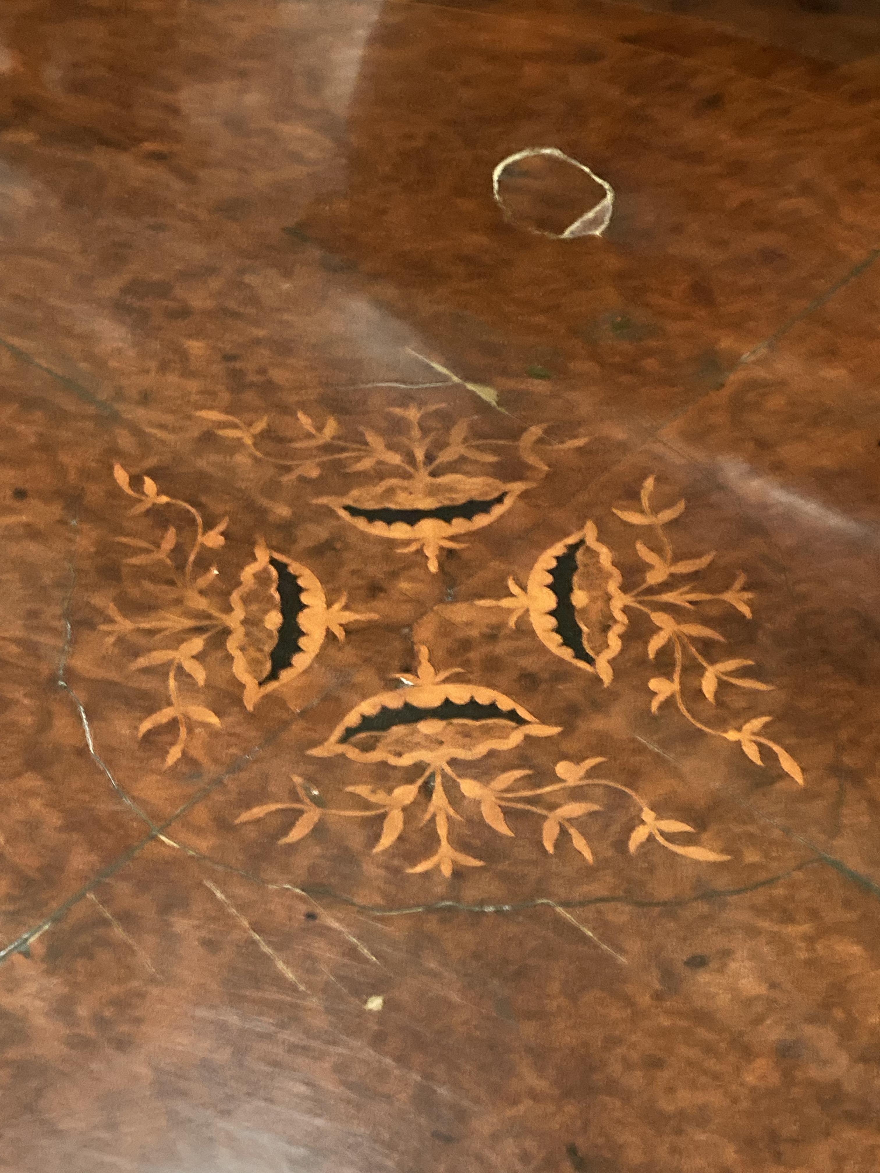 A Victorian walnut tilt top oval loo table with incised decoration to top 85cm x 120cm - Image 3 of 7