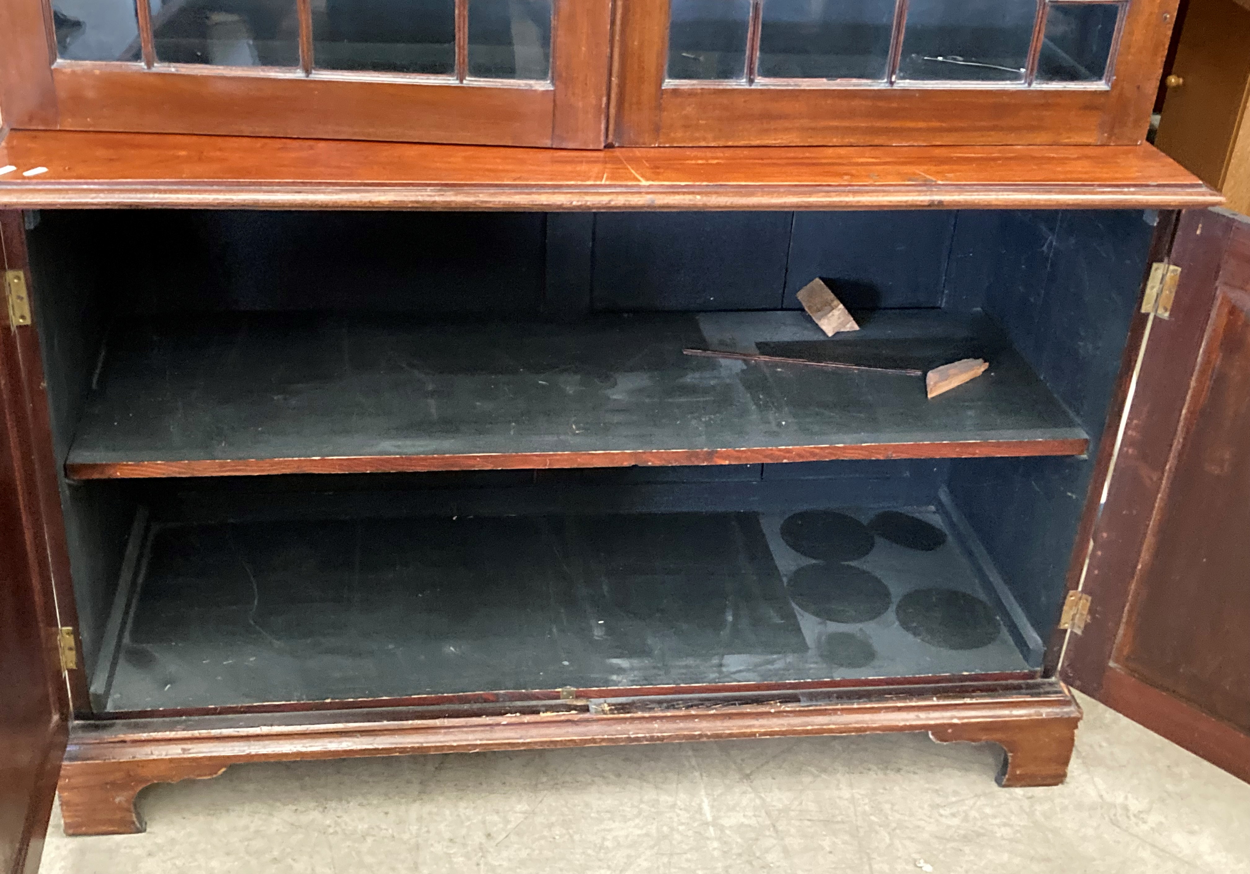 A large mahogany bookcase/wall unit with two Astragal glazed doors over two door base 140cm x 210cm - Image 3 of 3