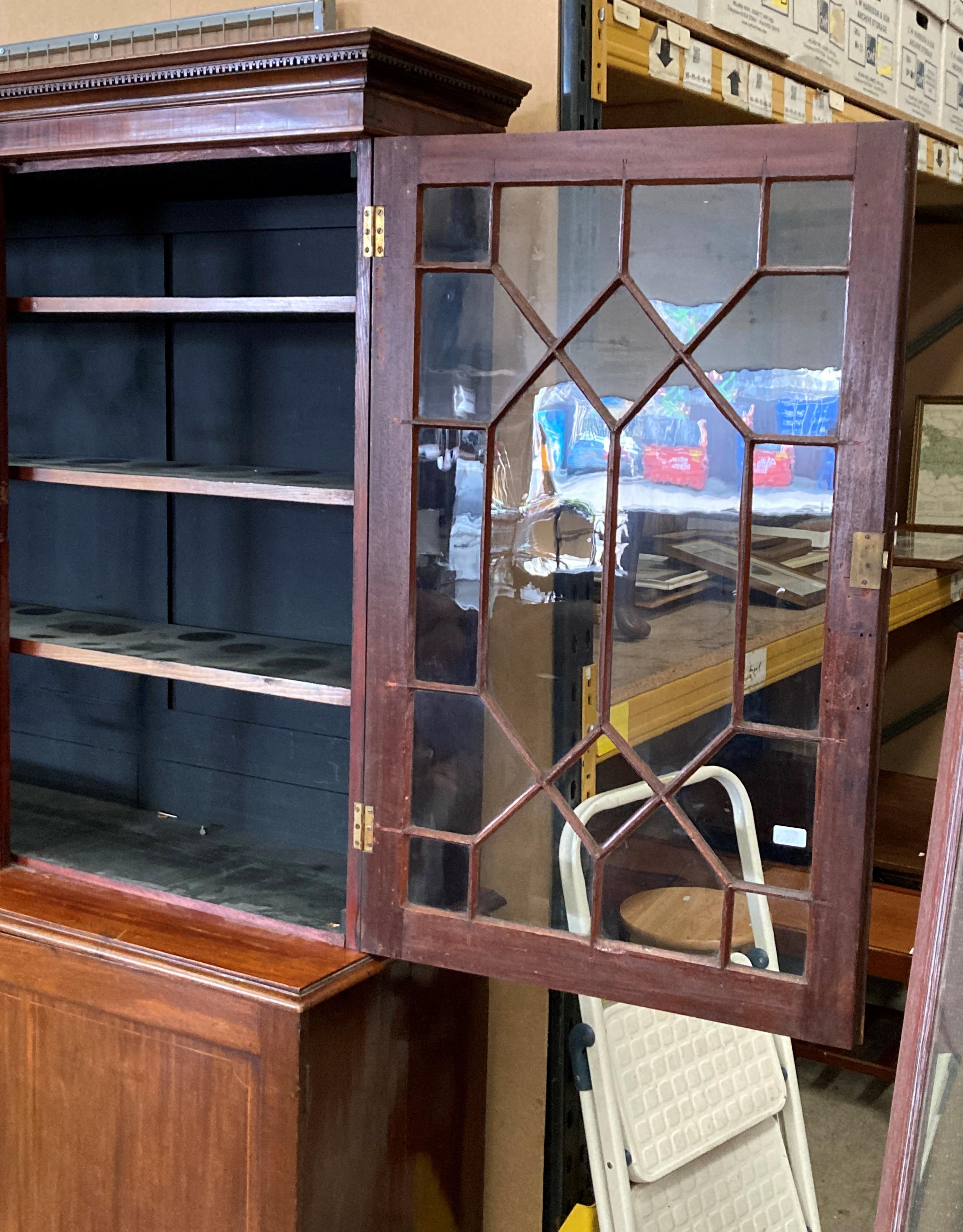 A large mahogany bookcase/wall unit with two Astragal glazed doors over two door base 140cm x 210cm - Image 2 of 3