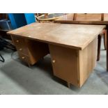 A Meredew Furniture light oak finish three drawer single door twin pedestal desk 132cm x 60cm
