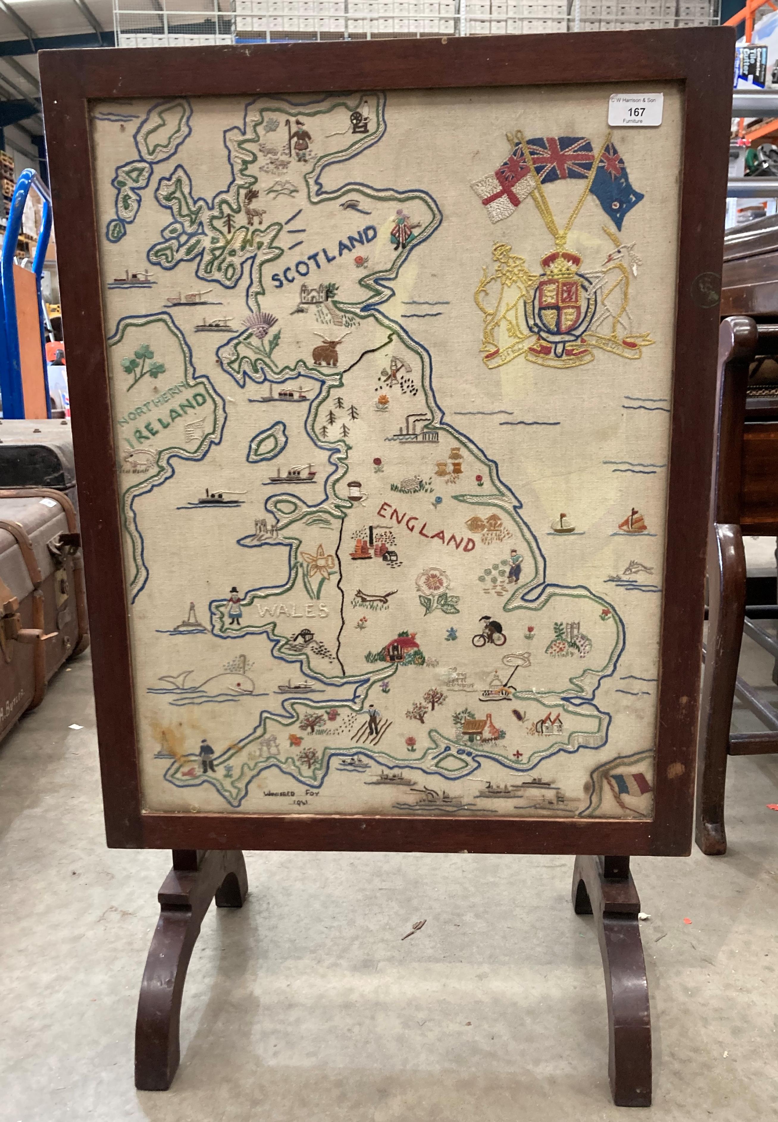An oak framed folding top tea table/fire screen embroidered with a map of the United Kingdom and