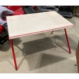 A red metal and chrome framed draughtsman's adjustable drawing board,