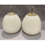 Two white glass ceiling light shades,