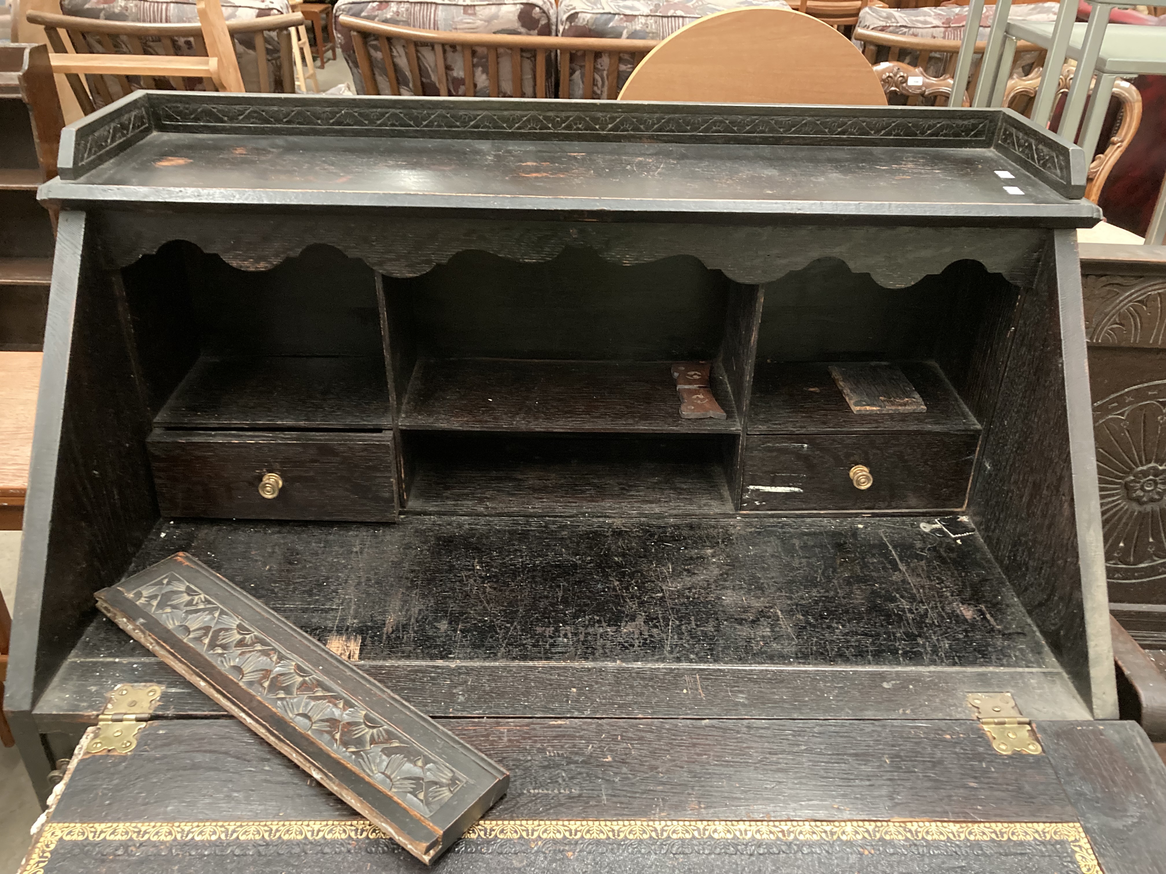 A carved oak bureau with fall flap over four drawer single door base 96cm x 114cm high (part of - Image 3 of 7