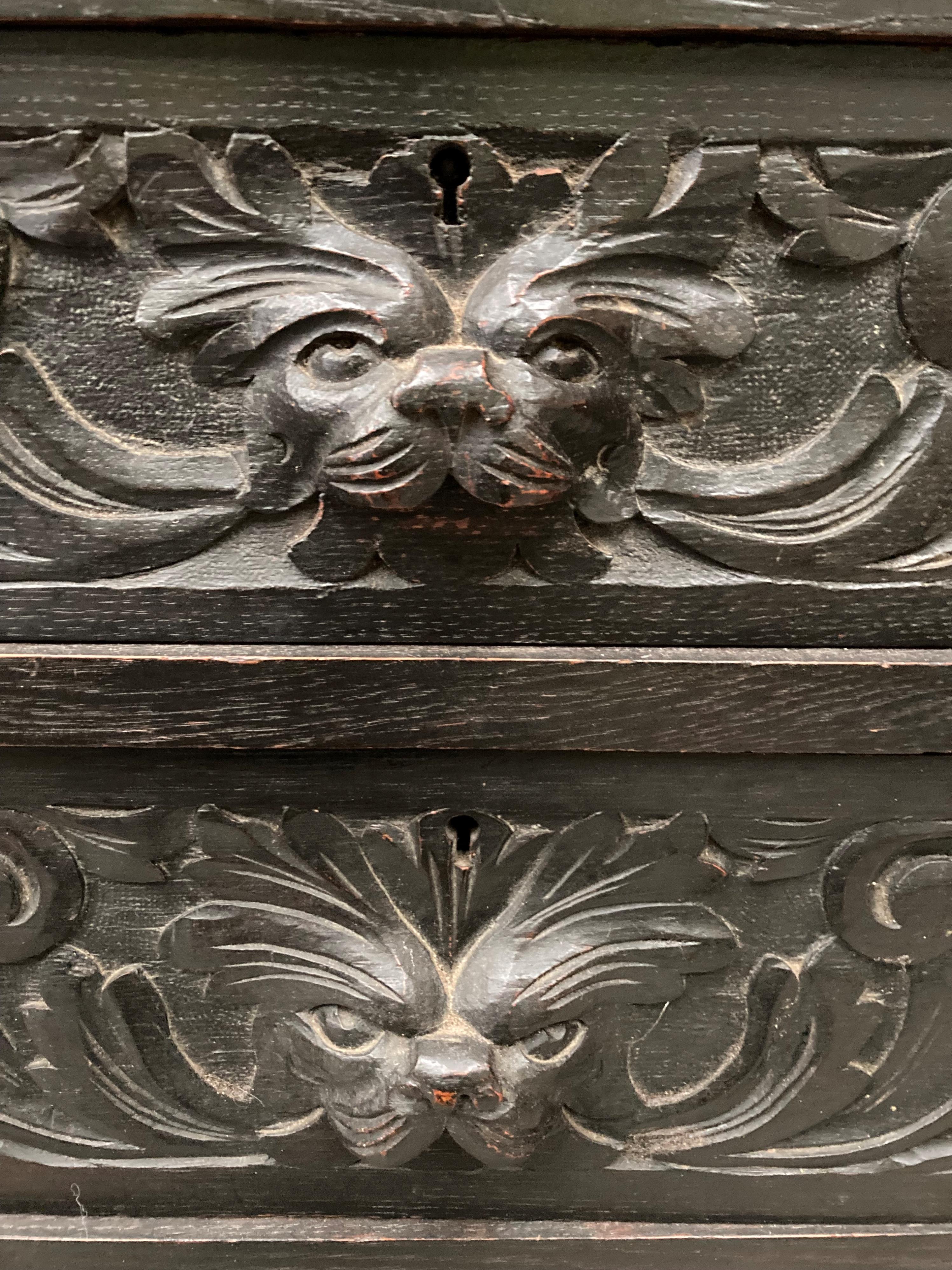 A carved oak bureau with fall flap over four drawer single door base 96cm x 114cm high (part of - Image 4 of 7