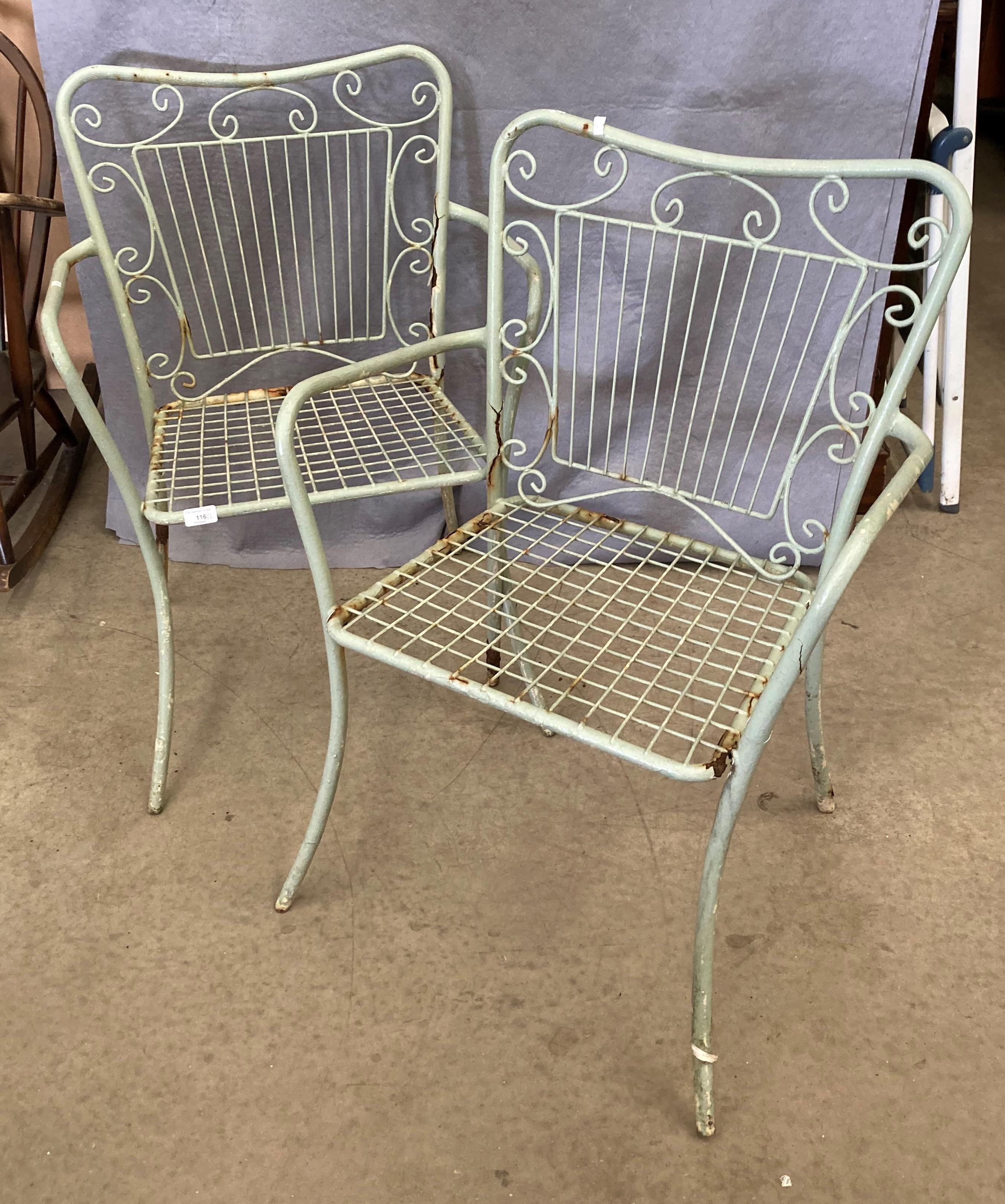 Two grey metal garden armchairs (one as seen)