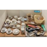 Contents to part of table - cups and saucers sets, Royal Worcester cups, assorted cutlery,