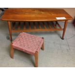 Teak coffee table 103cm x 42cm x 44cm high on castors with under shelf (some water damage to top)