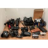 Twelve assorted binoculars, cameras, camcorders etc by Zenith, 10 x 50 Monatone 8 x 30,