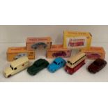 Five assorted restored Dinky toys diecast vehicles in reproduction boxes,