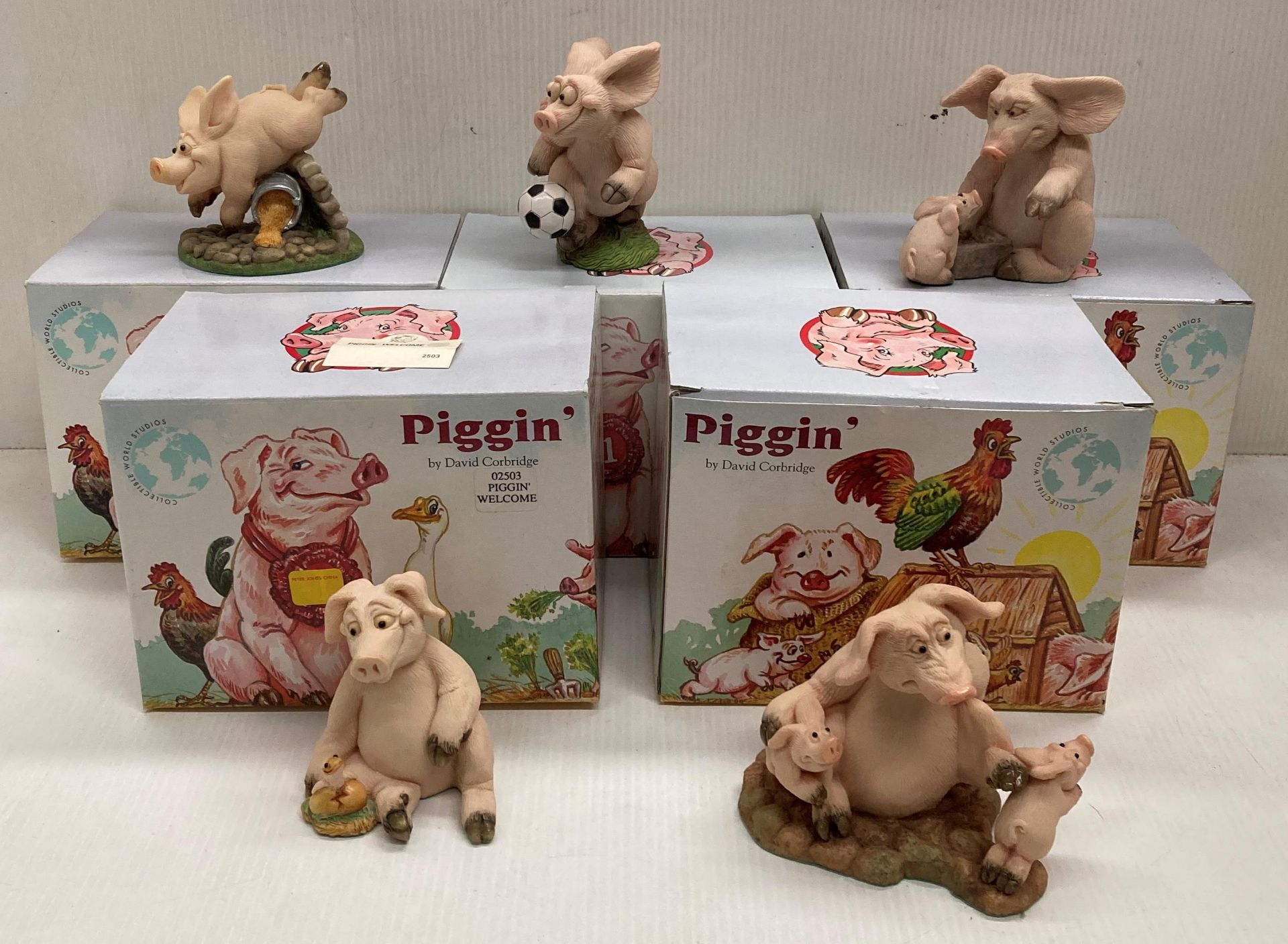 Five assorted "Piggin" collectable figures by David Corbridge - boxed, including freedom, football,