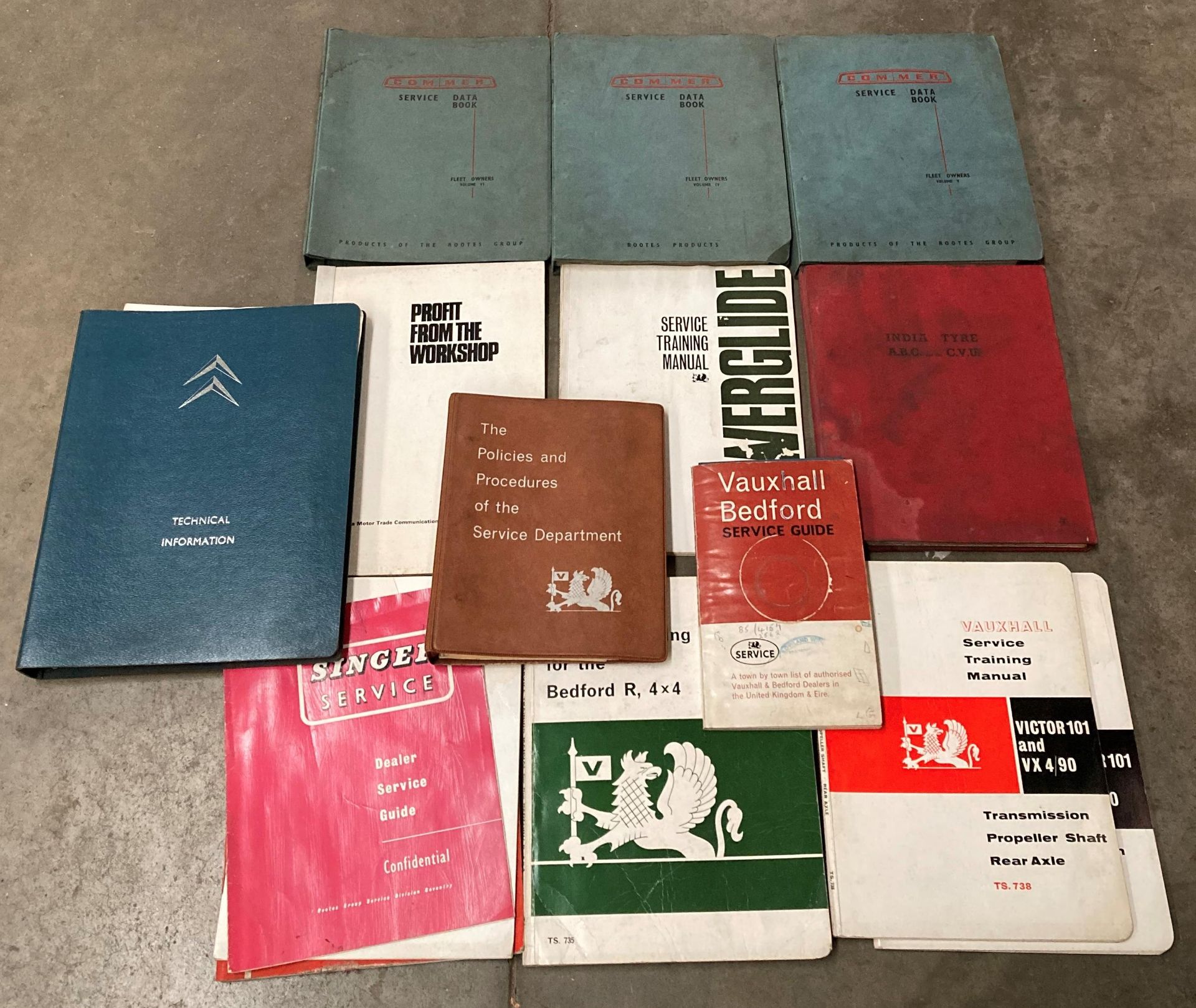 Contents to plastic box - assorted service training manuals for 60s and 70s vehicles and others -