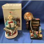 Melody in Motion musical figurines "Side Street Circus" and an Enesco "Musical and Action" camera