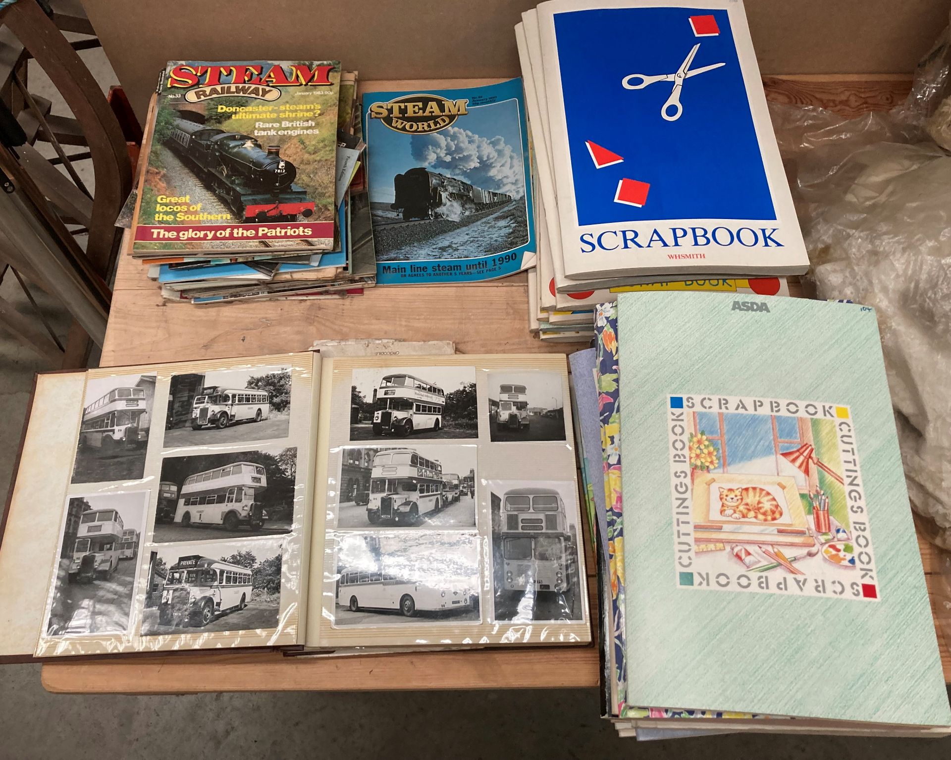 Contents to part table top - a quantity of scrap books containing colour photograph scenes of