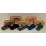 Five assorted restored Dinky toys diecast vehicles in reproduction boxes,