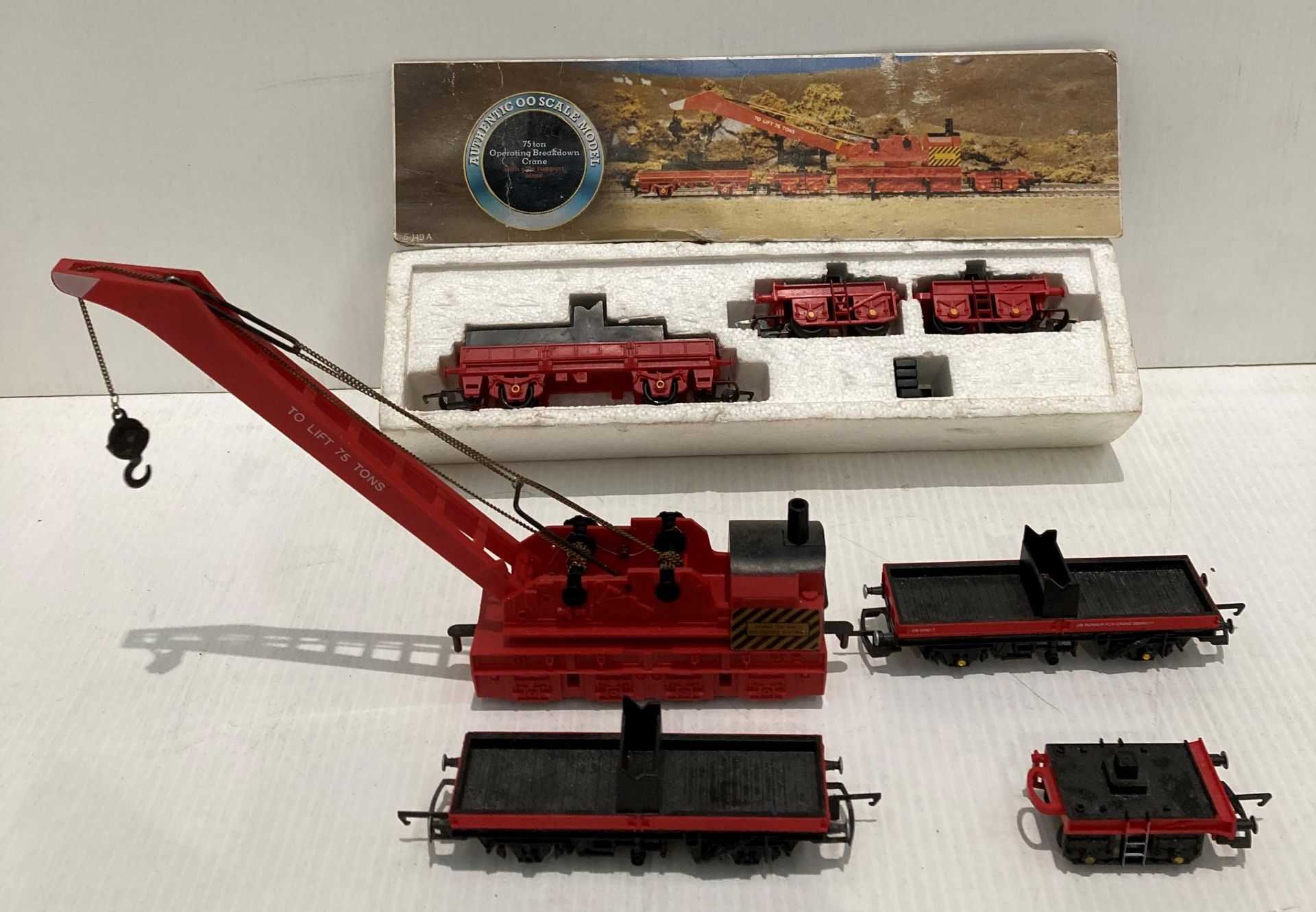 Authentic "OO" scale model of a 75 ton operating breakdown crane with side support arms and three