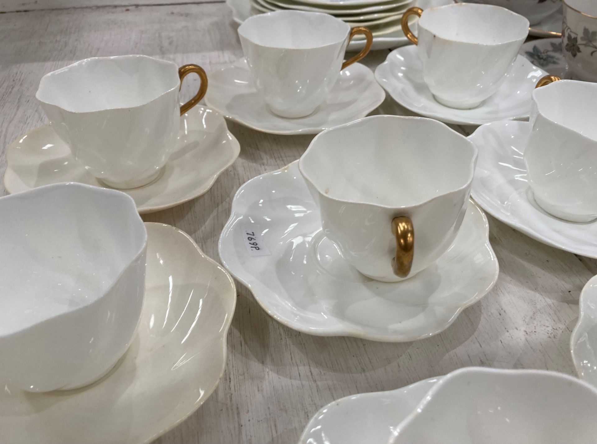 Twenty-four pieces of Coalport white and gold tea service including plates, - Image 2 of 3