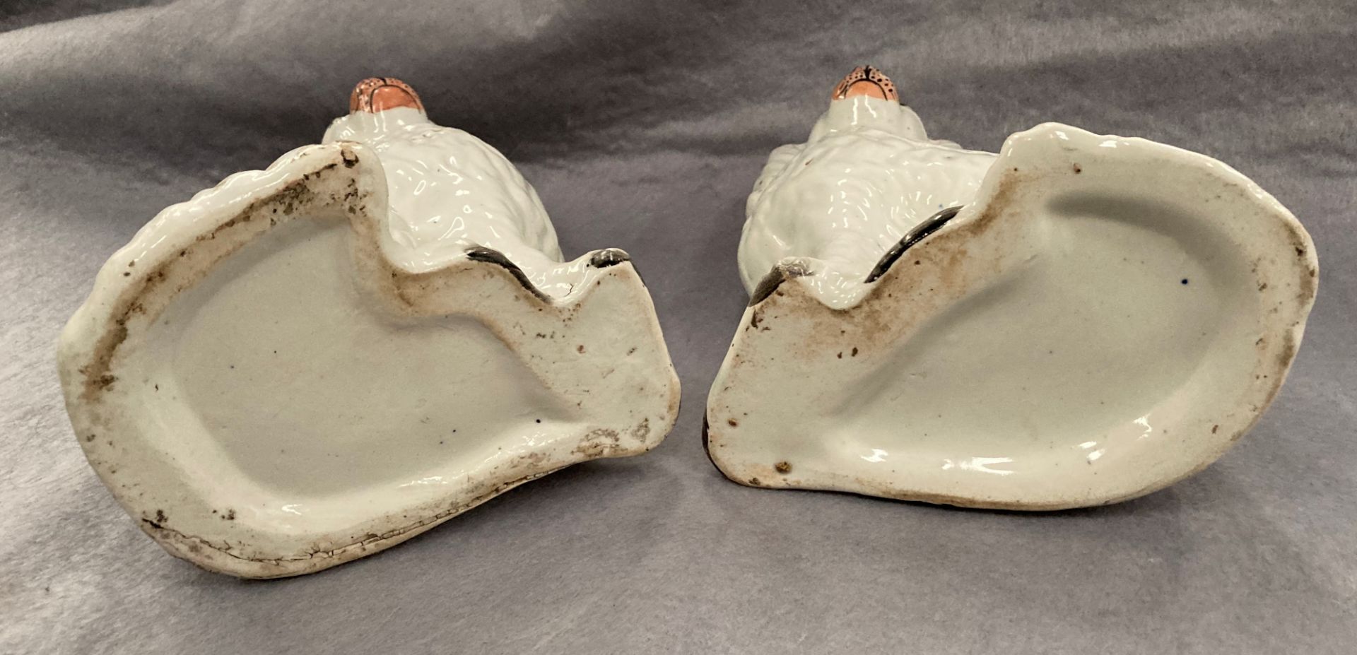 A pair of Staffordshire seated pottery Spaniels, - Image 4 of 5