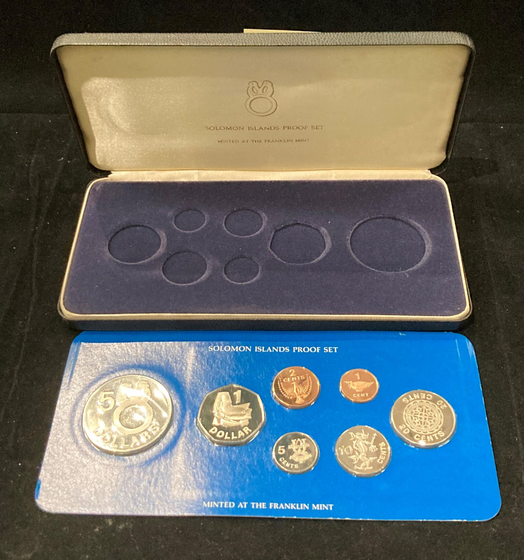 A Solomon Islands 1997 seven coin proof set minted at the Franklin Mint - cased.