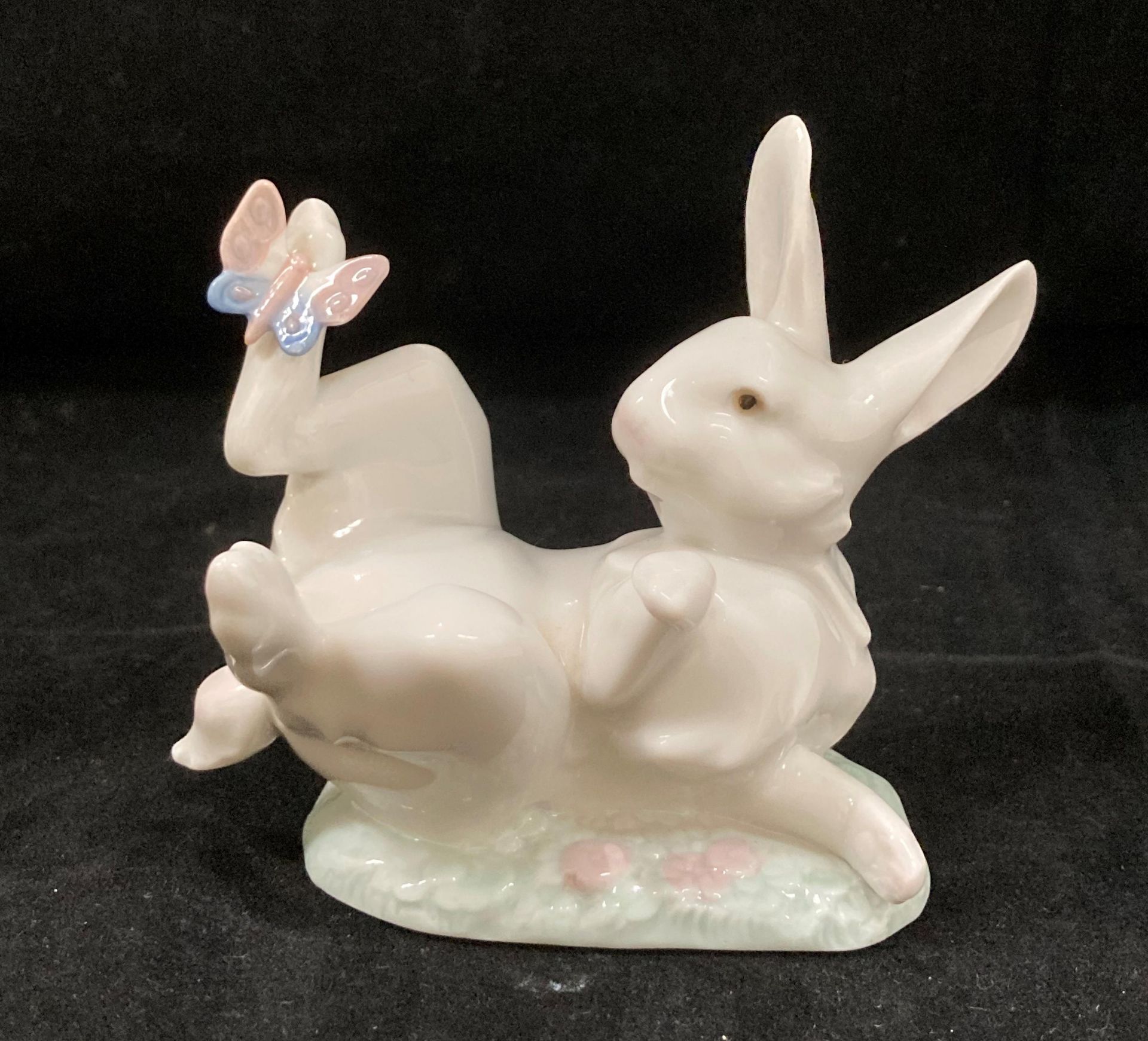 A Lladro figurine of a young girl holding a lamb and a Lladro rabbit with a butterfly No 5888 (2) - Image 4 of 5