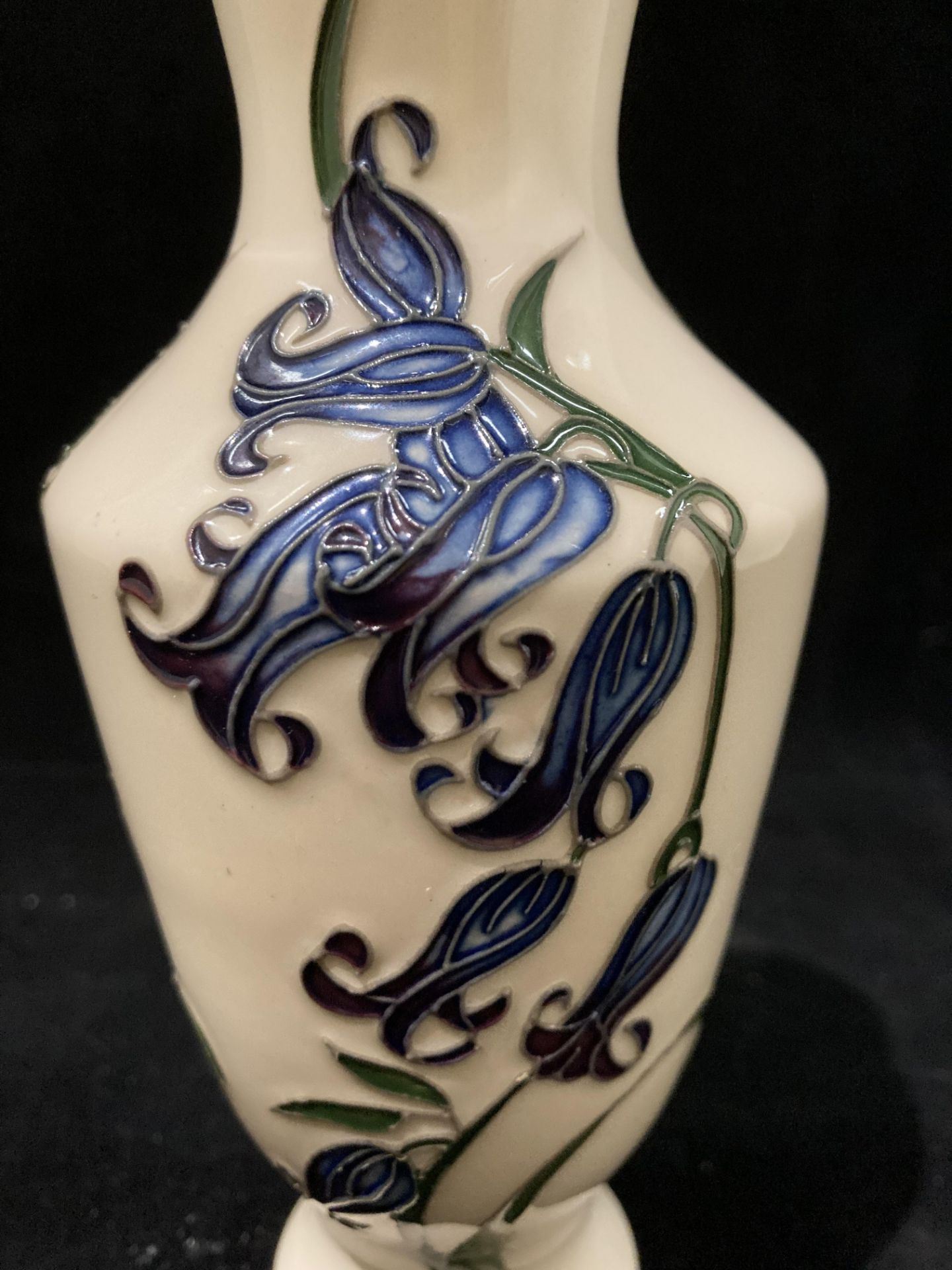 A Moorcroft cream and blue floral glazed vase 16cm high, signed 'HD 2009' to base. - Image 2 of 4