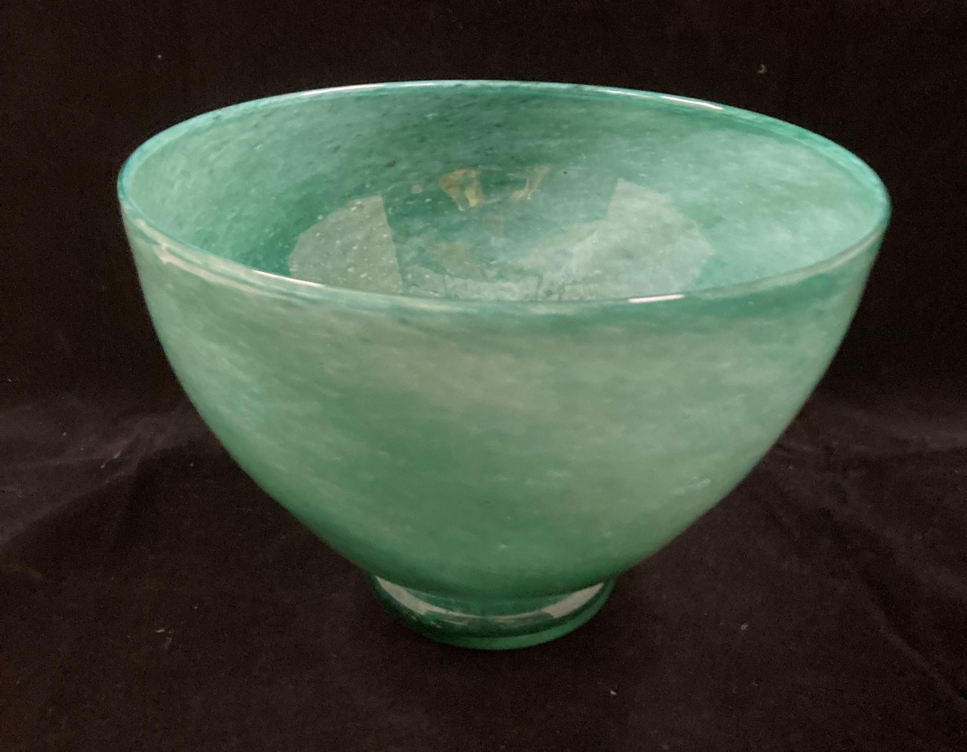 A Whitefriars cloudy green glass bowl 20cm diameter and 14cm high