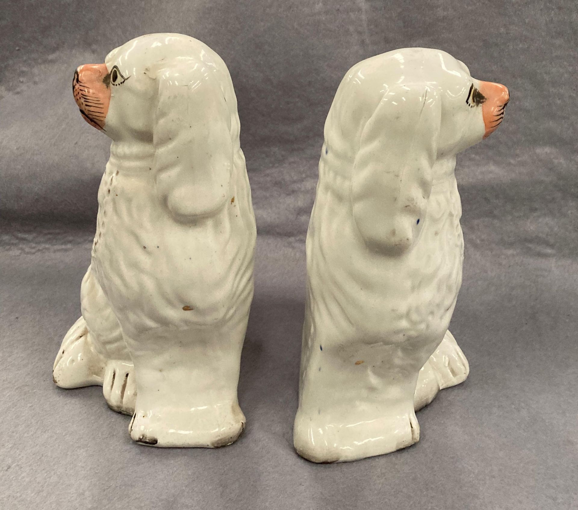 A pair of Staffordshire seated pottery Spaniels, - Image 2 of 5