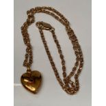 A 15ct gold heart shaped pendant on neck chain stamped 375 - total weight 8 grams.