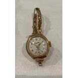 9ct gold (375) 'Everite' 15 jewels Swiss made ladies gold watch - total weight 14.9 grams.