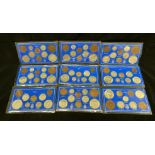 Nine Great Britain packaged King George VI coin sets 1937-1940 (ten piece), 1941-1943 (nine piece),