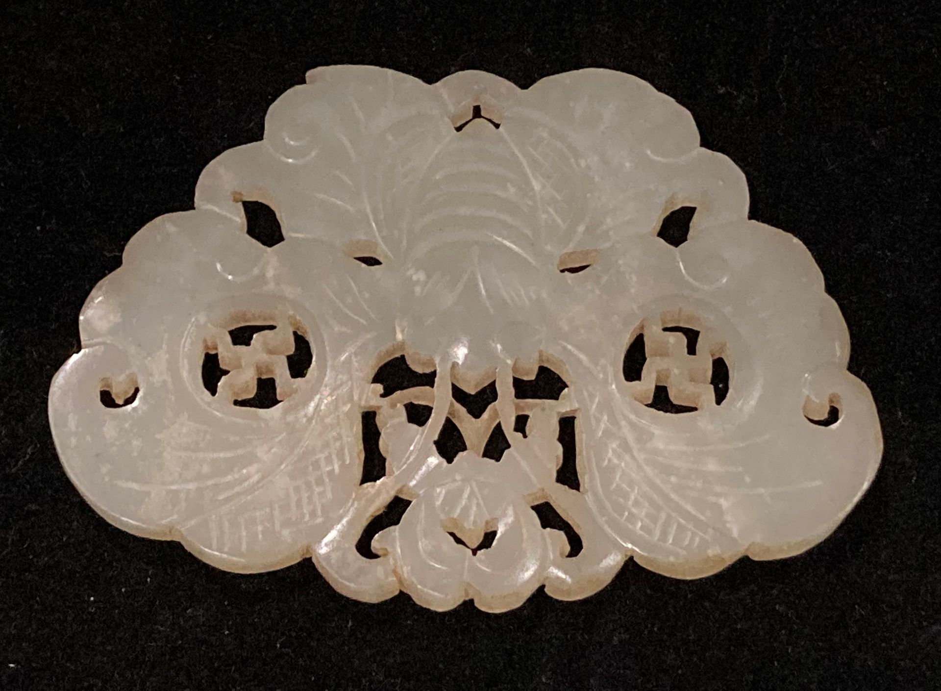 A Chinese Celadon 'hardstone' butterfly pendant, nineteenth century,